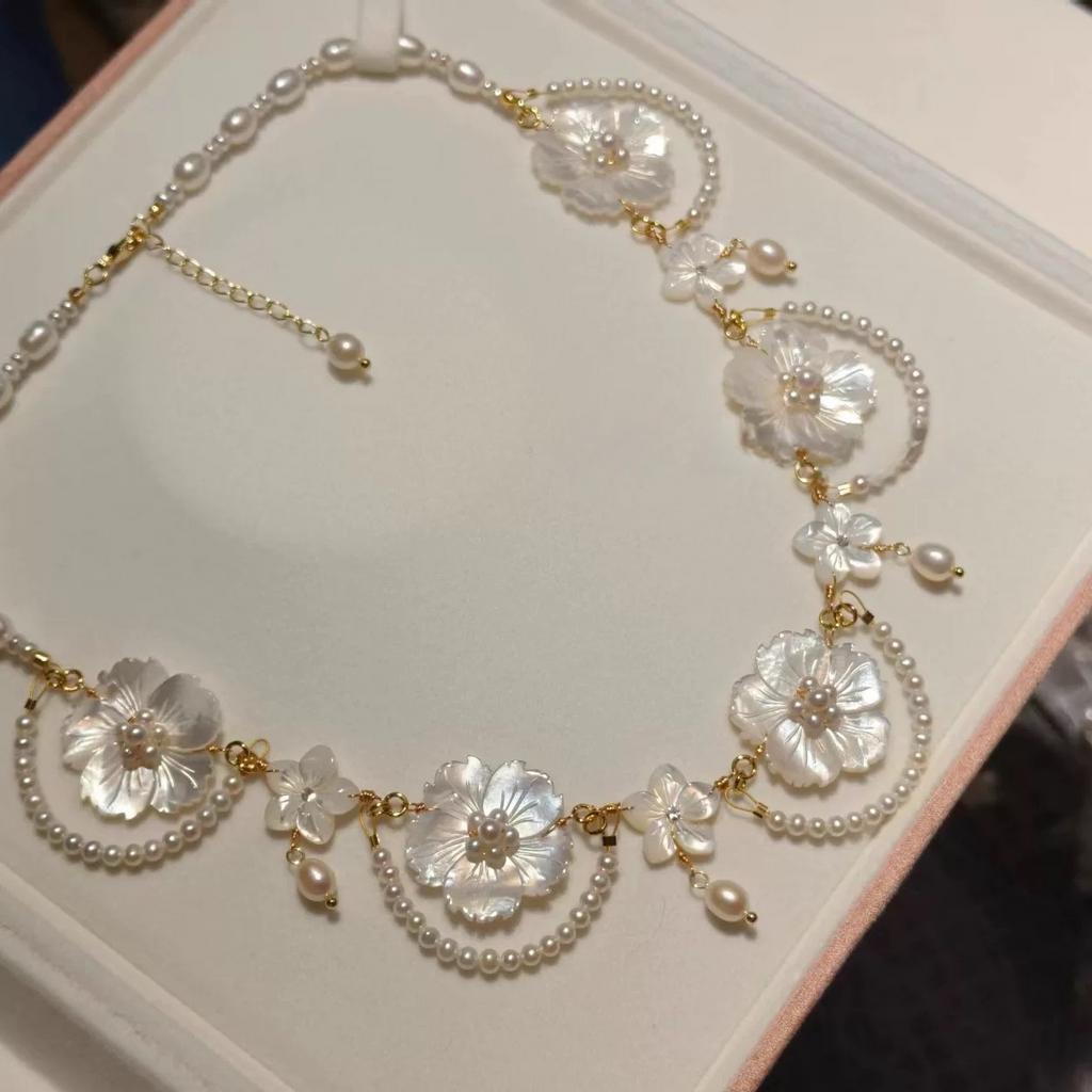 Handcrafted Pearl Necklace with Carved White Mother of Pearl Flower