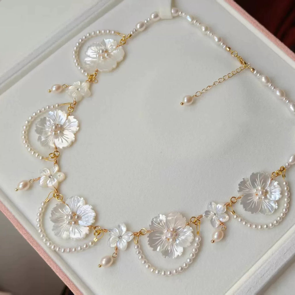 Handcrafted Pearl Necklace with Carved White Mother of Pearl Flower