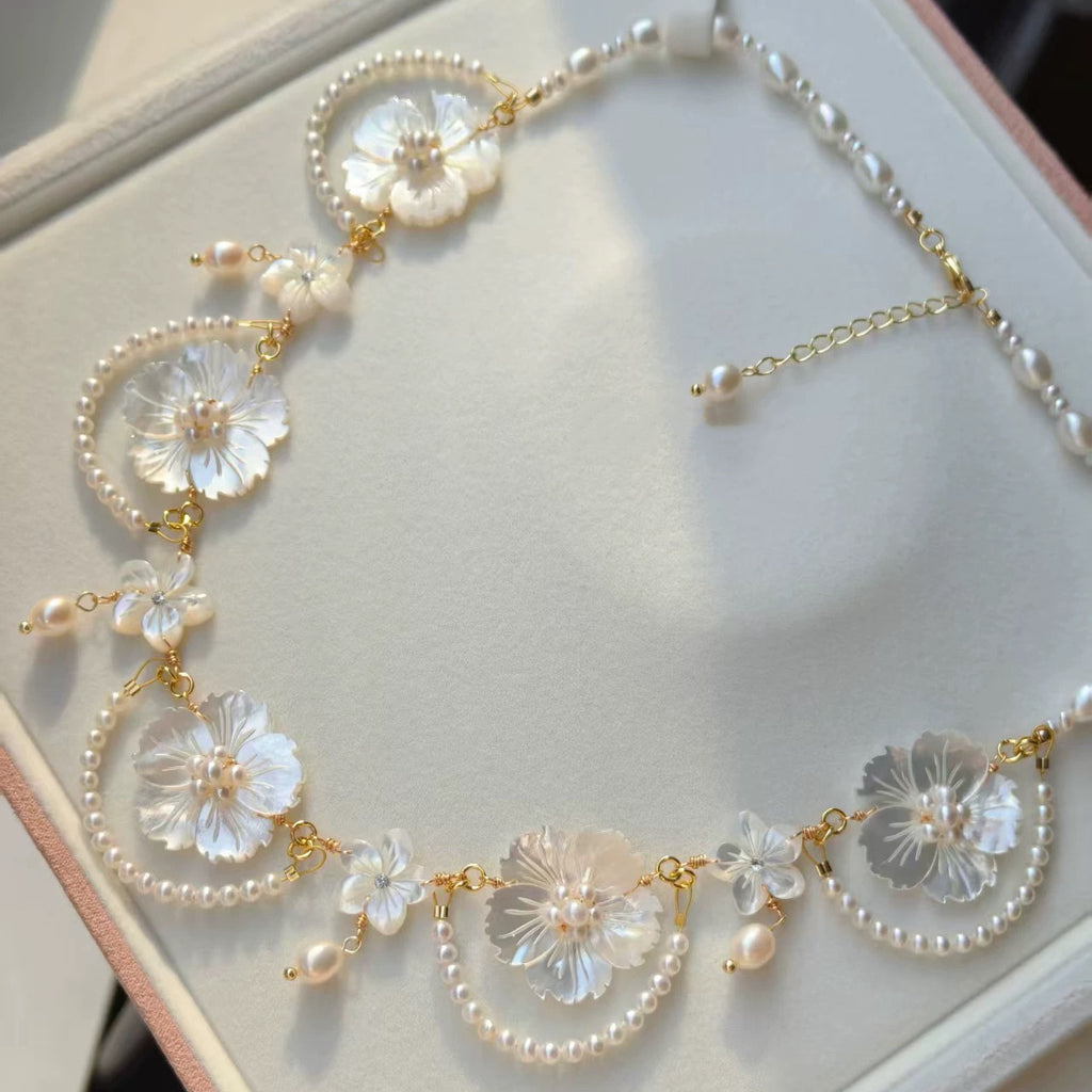 Handcrafted Pearl Necklace with Carved White Mother of Pearl Flower