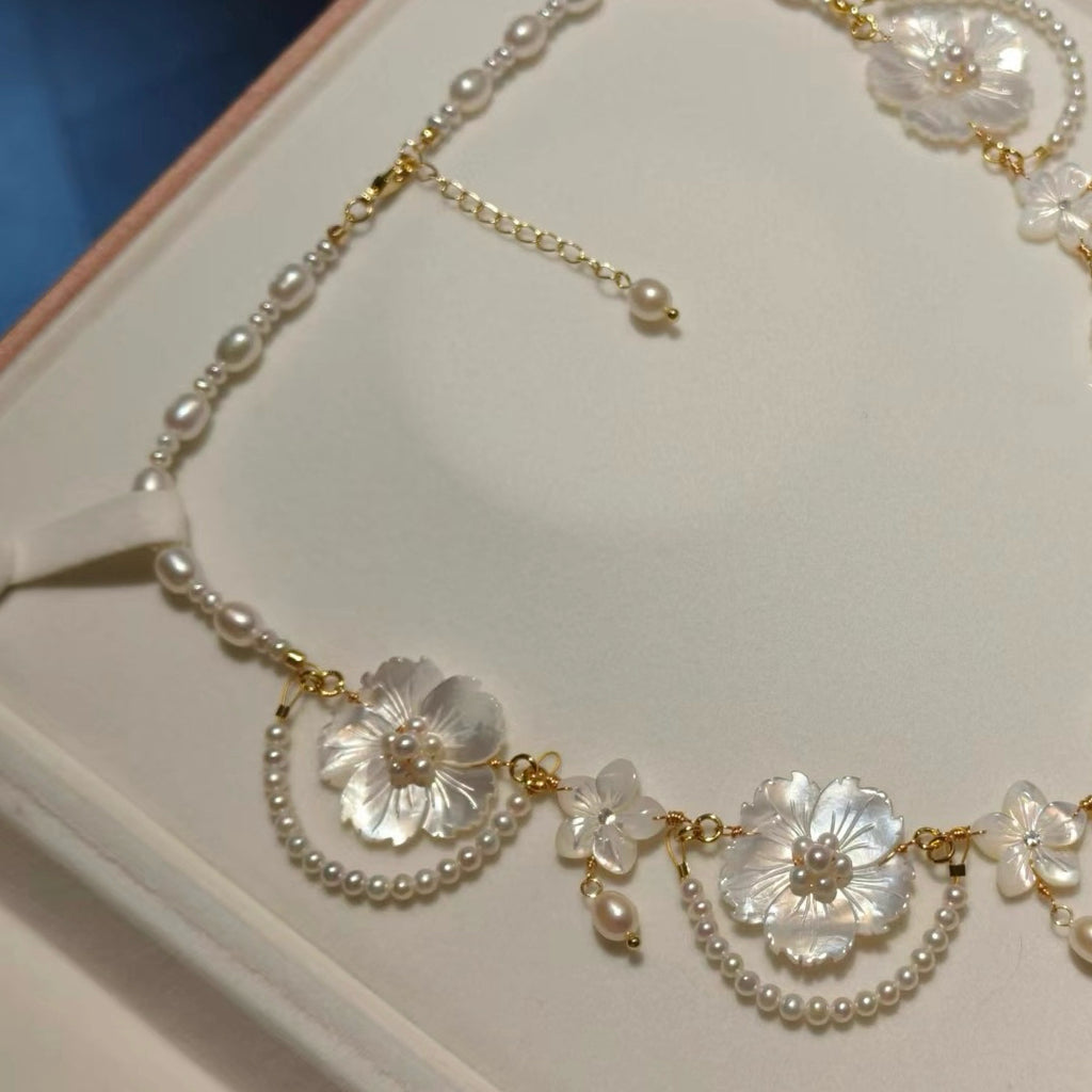 Handcrafted Pearl Necklace with Carved White Mother of Pearl Flower